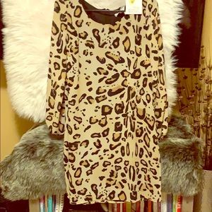 Never worn. Tags still in. Leopard pattern dress.